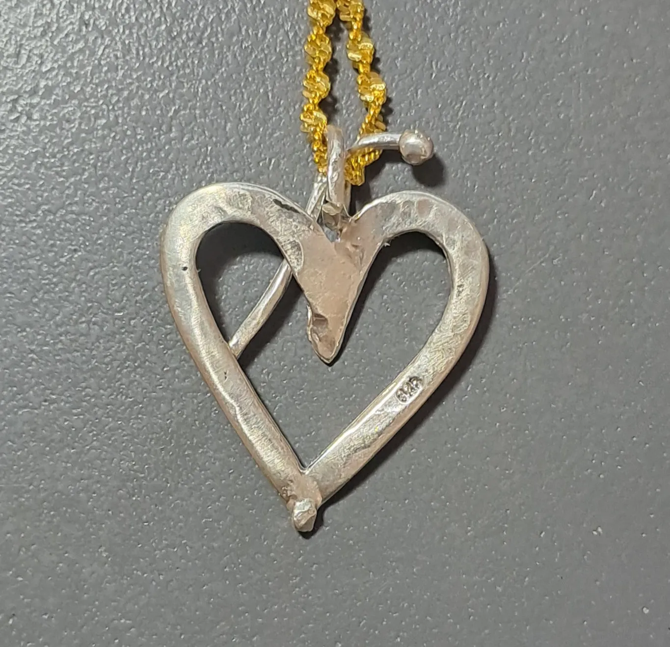 Sterling silver charm on Plexiglas - Heart Charm