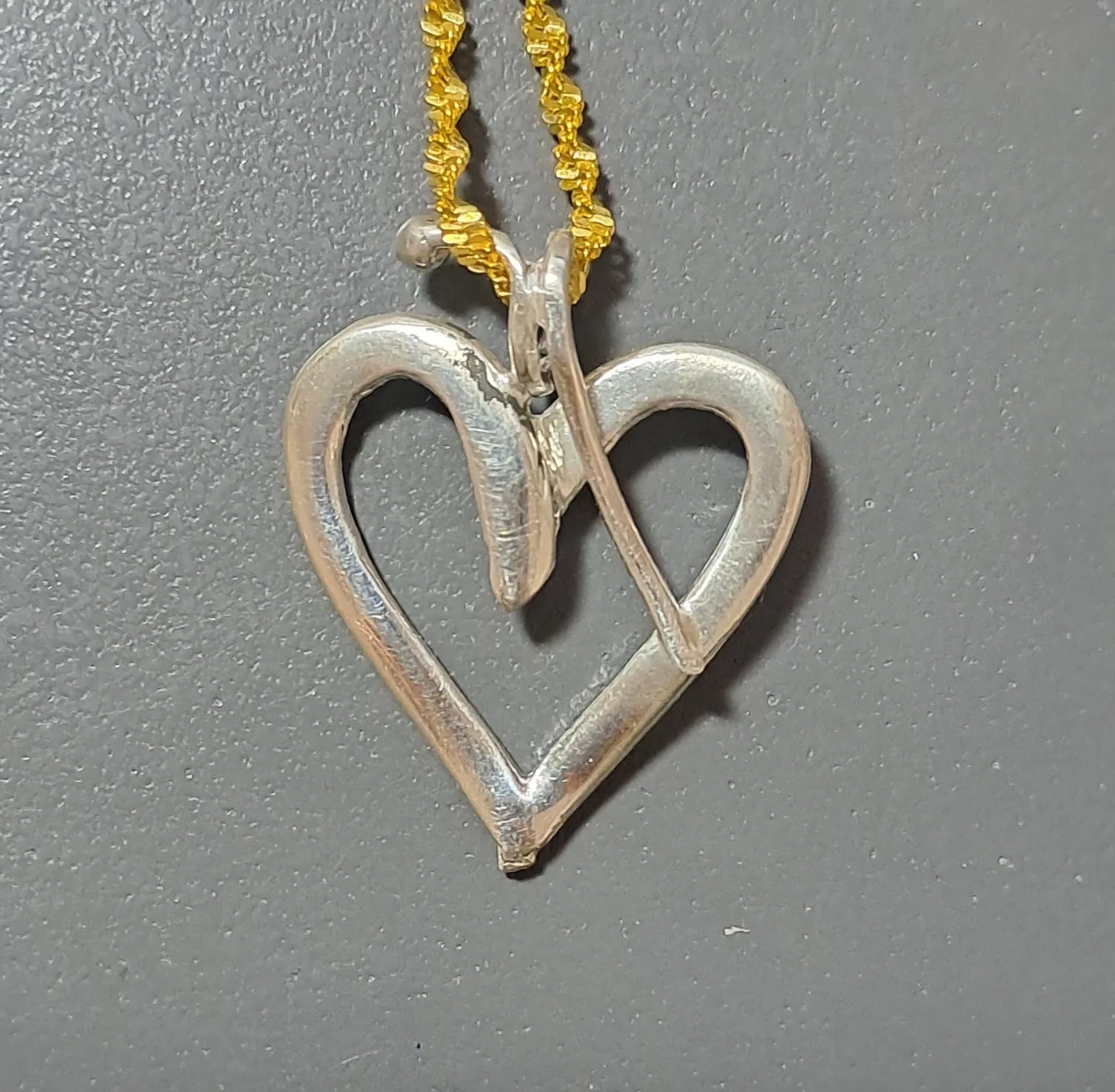 Sterling silver charm on Plexiglas - Heart Charm